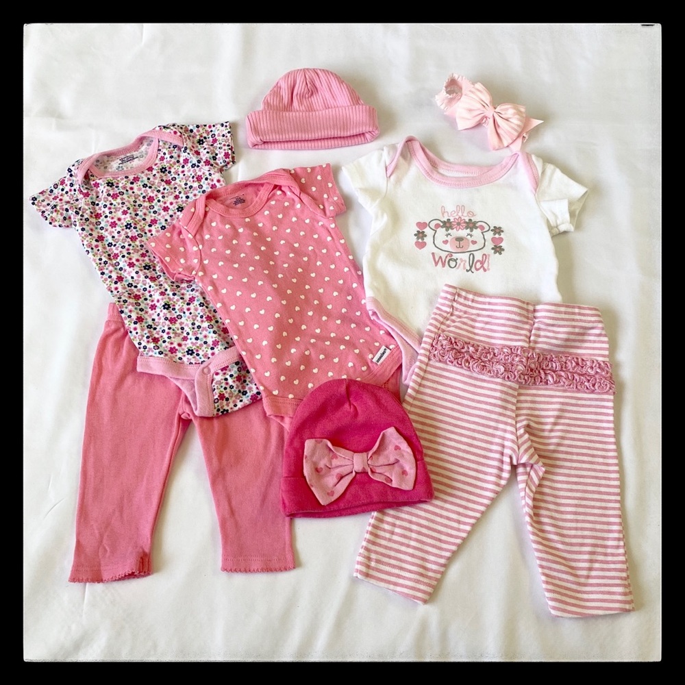 8 piece mix and match baby girl set. 0-3 months